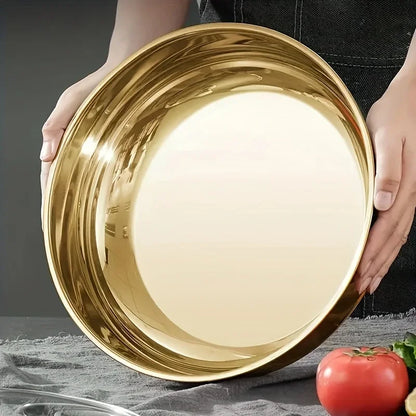 קערת נירוסטה גדולה בנפח רחב – אידיאלית לערבוב בצק, שטיפת ירקות, והכנת סלטים. מראה אסתטי, חלקה, נוחה לעבודה וקלה לניקוי.