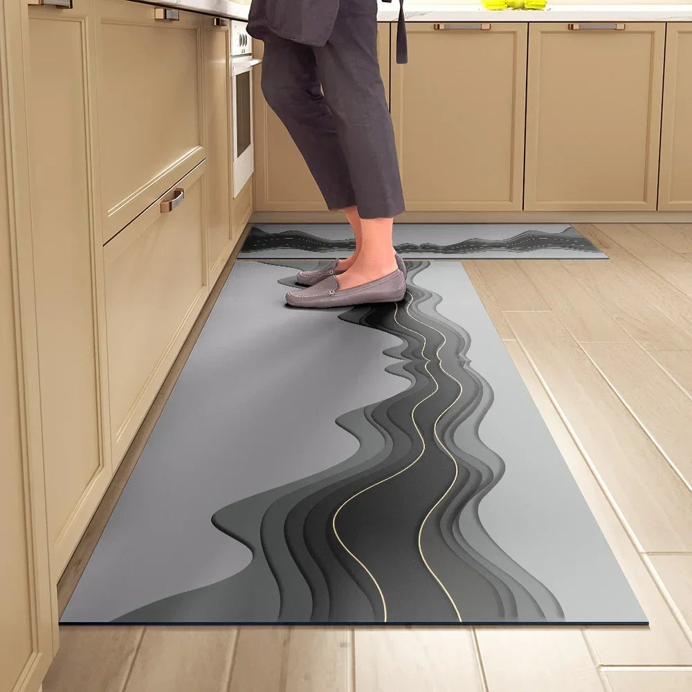 מזרון סופג למטבח – מונע החלקה, עמיד למים וקל לניגוב. שטיחון נוח לעמידה לאורך זמן, ניתן לניקוי מיידי ללא כביסה. אידיאלי למטבח מודרני, מגן על הריצפה ומוסיף נוחות.
