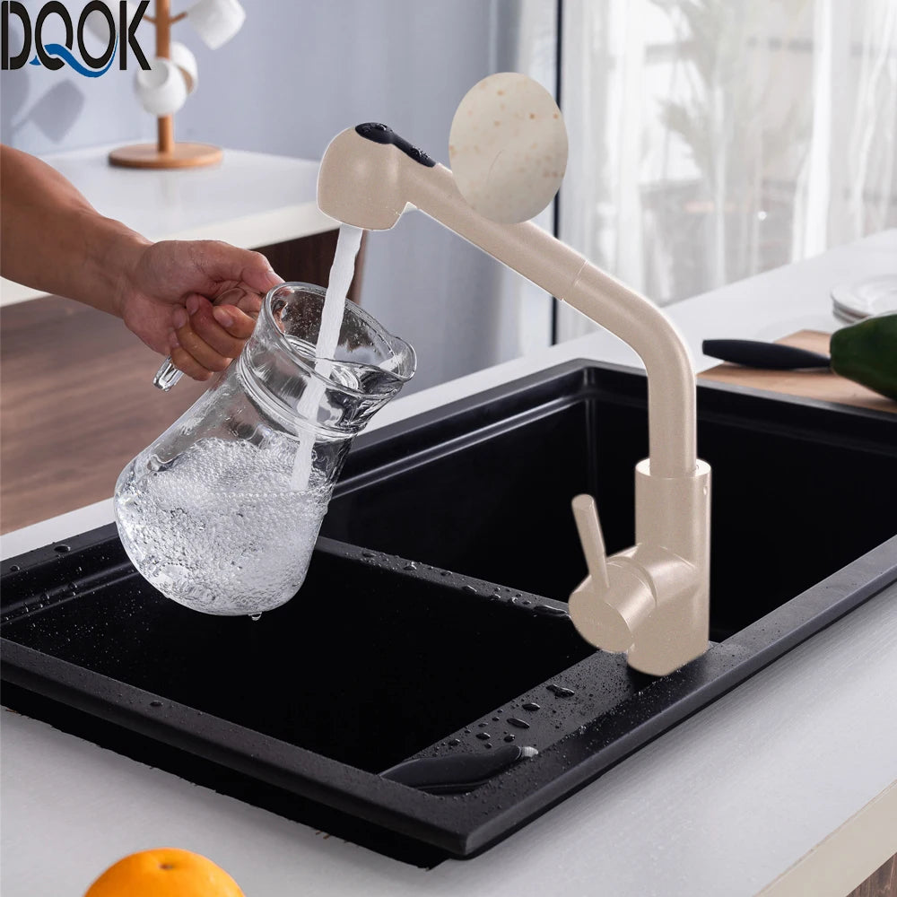 ברז מטבח שחור עם ראש נשלף, גוף מיקסר מניקל מוברש, מצב זרם ורסס, עיצוב מודרני למטבח.