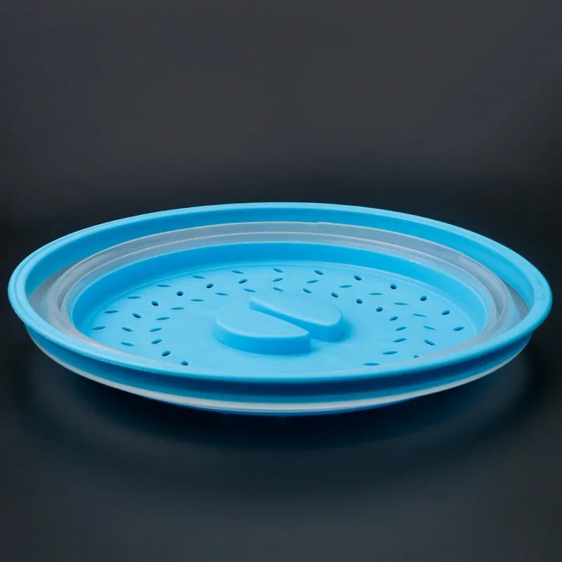 מכסה מתקפל למיקרוגל – מונע התזת שמן, שומר על טריות ומונע לכלוך בזמן חימום ובישול. פתרון נוח ויעיל למטבח נקי ומהיר.